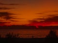 light red and orange sunset view gorgeous panorama scenic with red cloud sky of tropical sea beach Royalty Free Stock Photo