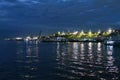 The light reflection of several goods ferries on the Amazon river during dawn, at the busy port of Manaus, Brazil Royalty Free Stock Photo