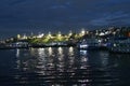 The light reflection of several goods ferries on the Amazon river during dawn, at the busy port of Manaus, Brazil Royalty Free Stock Photo