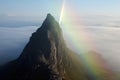 light refraction creating a brocken spectre on a mountain peak Royalty Free Stock Photo
