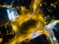 The light on the road roundabout at night and the city. Aerial view. Top view. Background scenic road