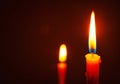 Light the room dark for the background. Candlelit in the dark, Candle flame at night. Royalty Free Stock Photo