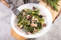 Light salad with agretti, a spring vegetable from Italy, tuna, black olives and olive oil for slimming and weight loss Royalty Free Stock Photo