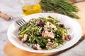 Light salad with agretti, a spring vegetable from Italy, tuna, black olives and olive oil for slimming and weight loss Royalty Free Stock Photo