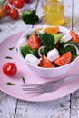 Light salad with broccoli, cherry tomatoes and feta cheese Royalty Free Stock Photo