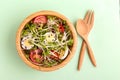 Light salad with radish sprouts, quail eggs, cherry tomatoes, sesame