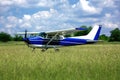 Light school airplane on grass Royalty Free Stock Photo