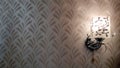 Light sconce in the corner of the frame with wallpaper background Royalty Free Stock Photo