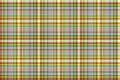 Light seamless pattern of tartan ornament for textile texture with soft blue and green threads on yellow background Royalty Free Stock Photo