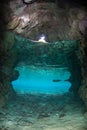 Light Seeps Into Shallow Underwater Cave Royalty Free Stock Photo