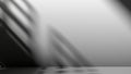 Light and shadow coming into the room, shadow of window frame and pillars, GOBO light, gray and black Elegant and Modern 3D Royalty Free Stock Photo