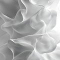 Light and shadow on intricate white fabric layers