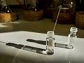 Light and shadow of LCMS vials in a chemical hood along with capillary for TLC sampling Royalty Free Stock Photo