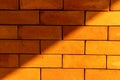 Details of a light and shadow on the red brick wall texture background. Royalty Free Stock Photo