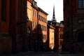 Light and shadow reflects on historic buildings in Gamla Stan, the old town of Stockholm, Sweden