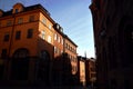 Light and shadow reflects on historic buildings in Gamla Stan, the old town of Stockholm, Sweden