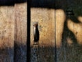 Light and shadow on the wood door. Royalty Free Stock Photo