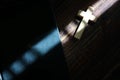 Light and shadow on wooden cross and bible on retro wood floor Royalty Free Stock Photo