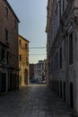 The light and shadows in the empty narrow alleys of Venice  during the coronavirus Royalty Free Stock Photo