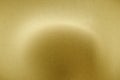 Light shining on brushed gold metal panel, abstract texture background Royalty Free Stock Photo