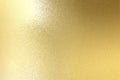 Light shining on brushed gold metal plate texture, abstract background Royalty Free Stock Photo