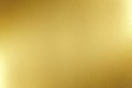 Light shining on gold metal board, abstract texture background Royalty Free Stock Photo