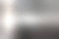 Light shining on rough chrome metal wall texture, abstract background Royalty Free Stock Photo