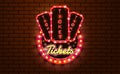 Light sign ticket booth brickwall background