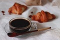 Light and simple french breakfast of coffee and croissant