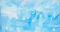 Light sky blue alcohol ink abstract background. Flow liquid watercolor paint splash texture effect illustration for card design Royalty Free Stock Photo