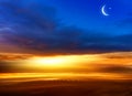 Crescent moon with beautiful sunset background . Generous Ramadan . Light from sky . Religion background . Royalty Free Stock Photo