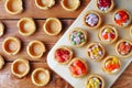 Light snacks for the festive table on a wooden table. Rustic background