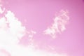 Light soft pink sky background. Angel wings clouds Royalty Free Stock Photo