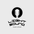 Light sound music school logo. Guitar pick shape