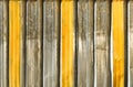 Light steel panel with yellow coloumns. Background. Royalty Free Stock Photo