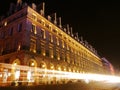 Light streams on a busy Paris road