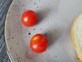 light summer breakfast tomatoes with bread on a plate Royalty Free Stock Photo