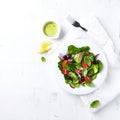 Light summer salad with whole olives. Flat lay.