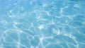 Light sunlight through crystal clear fresh blue water reflection background