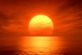 Light sunset orange sun calm orange sea with sun through nature horizon over the water with a cloudy sky Royalty Free Stock Photo