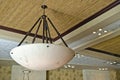 Light suspended from ceiling