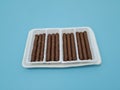 A light sweet chocolate snack in the form of a crunchy stick in Indonesia is called Astor