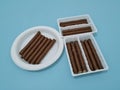 A light sweet chocolate snack in the form of a crunchy stick in Indonesia is called Astor