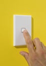 Light Switch Being Pushed