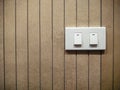 Light switch on the cement wall Royalty Free Stock Photo