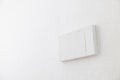 Light switch, Close-up White plastic mechanical switch mounted on a white wall Royalty Free Stock Photo