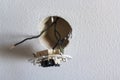 Light switch disassembled with exposed wires