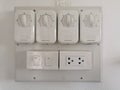 Light switch group and white light socket Royalty Free Stock Photo