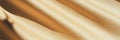 Light tan paper with fine diagonal crosshatch texture and smooth finish under soft lighting