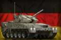 Light tank apc with pixel city camouflage on the Germany national flag background. 3d Illustration